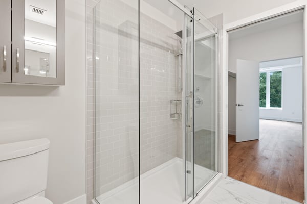 Installing shower doors | Bathroom remodeling process | Alabama Construction Pros Installing shower doors | Bathroom remodeling process | Alabama Construction Pros